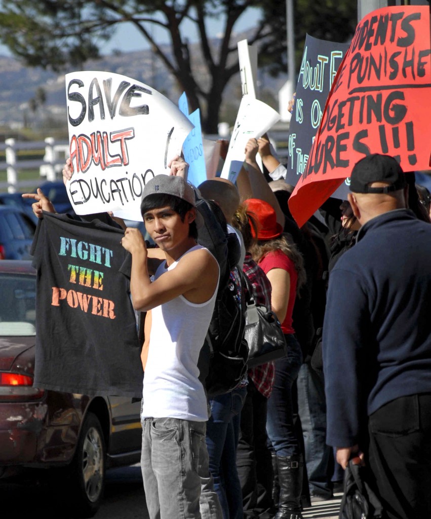 Erwin Torres, a Pierce College freshman studying Marine Biology, partook in the West Valley Occupational Center student protest on Wednesday, February 8, 2012.  The protest was held at the intersection of Winnetka Avenue and Victory Boulevard in Woodland Hills, Calif. Photo: Todd Rosenblatt