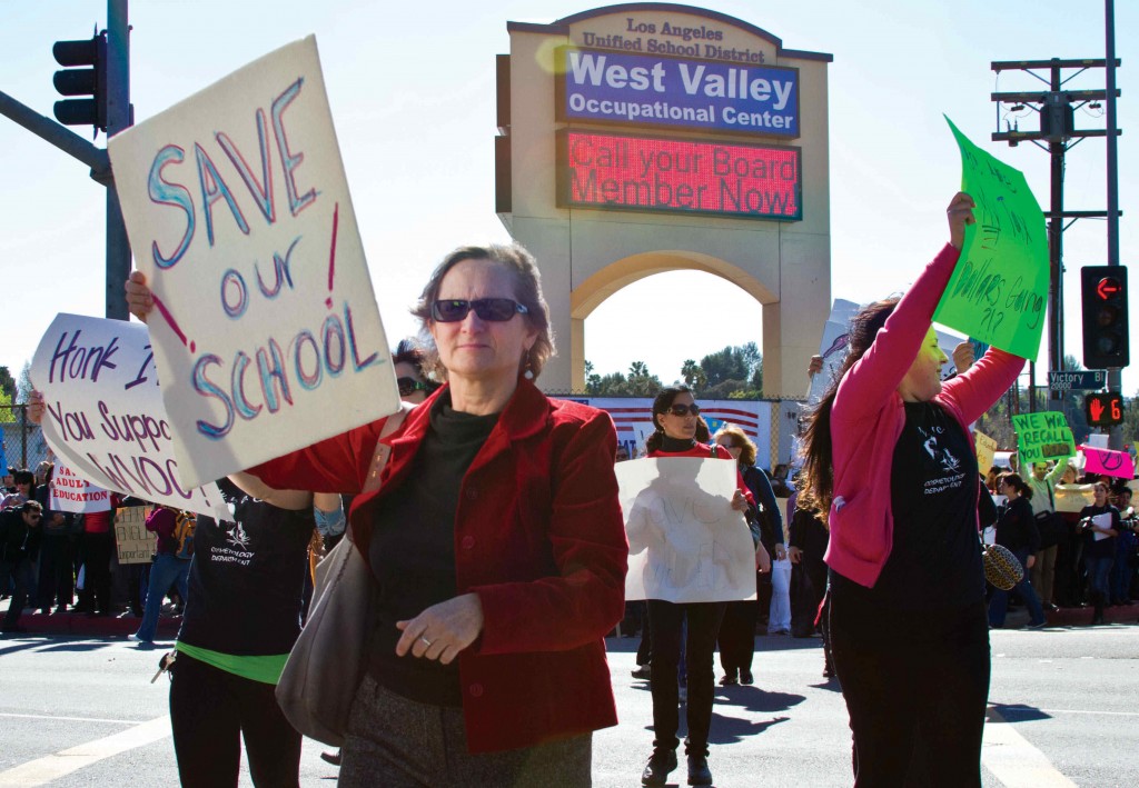 Karen Hribar ESL teacher since 1980 at the West Valley Occupational Center walks North on Winnetka Ave along with other protestors of the proposed elimination of Los Angeles Unified School District Adult Schools. Wednesday February 8, 2012. Woodland Hills, Calif. Photo by: Angela Tafoya