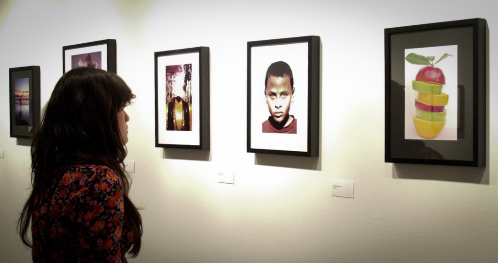 Pierce College Student, Monica Salazar stands observing a photo entry that was entered into Pierce College's 35th annual Photo Salon by a photography Student. The Photo Salon took place at Pierce College's art gallery, upstairs in the art department on Thursday, February 23, 2012. Photo by: Sarah Storey