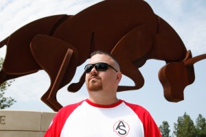 Associated Students Organization President Gustavo Sandoval, 31, says he is more of a person who gets things done than someone who only talks about doing things. He stands in front of the Pierce College Bull statue on Sept. 9. Photo by: Anabella Apfelbaum