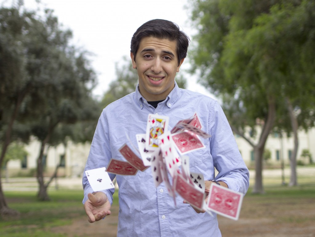 Magician and Pierce College student John Accardo lets his deck fly by the mall of Pierce College in Woodland Hills, Calif., Photo: Nicolas Heredia