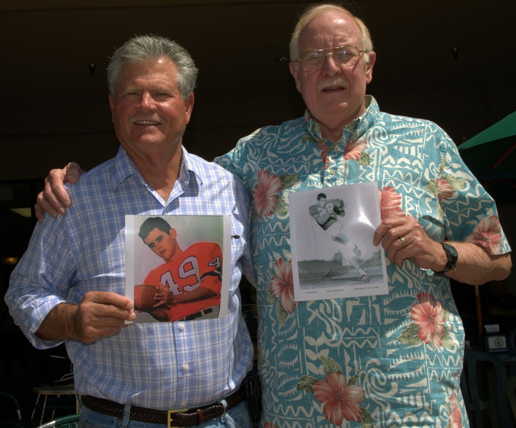 Bill Sweeney the brother of Neil Sweeney and Brick Durley, Neil's closet friend all former Pierce College  Brahma's Football team members hold a picture of Neil who died in 2008, in Thousand Oaks April 8, 2014. Neil will be inducted posthumous into the Pierce College Hall of Fame. Neil was a starter with the Brahmas, went onto start fro University of Tulsa in Oaklahoma where he ws an All American and drafted by the Denver Brocos for whom he played two years. James H Channell the Roundup News