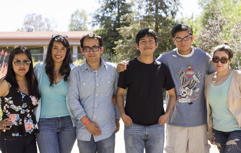 (left to right) Paloma Jacinto, Iris Delgado, Jesus Lara, Willy Morales, Edgardo Roncagliolo and Jaclyn Orellana of the We BUILD club pose in the Botanical Garden Thursday, May 15, 2014. The We BUILD club works to inform undocumented students of the financial options available to them.