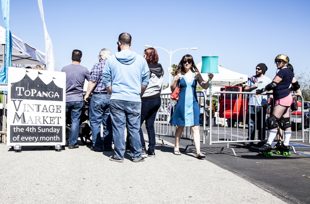 Visitors and buyers wait in line to get into the Vintage Market on Feb. 23. Photo: Lynn Levitt.