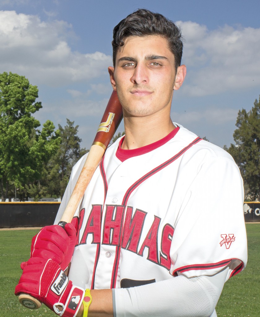 Joe Moran, right fielder for the baseball team, poses for a photo on Joe Kelly field. Photo: Nicolas Heredia