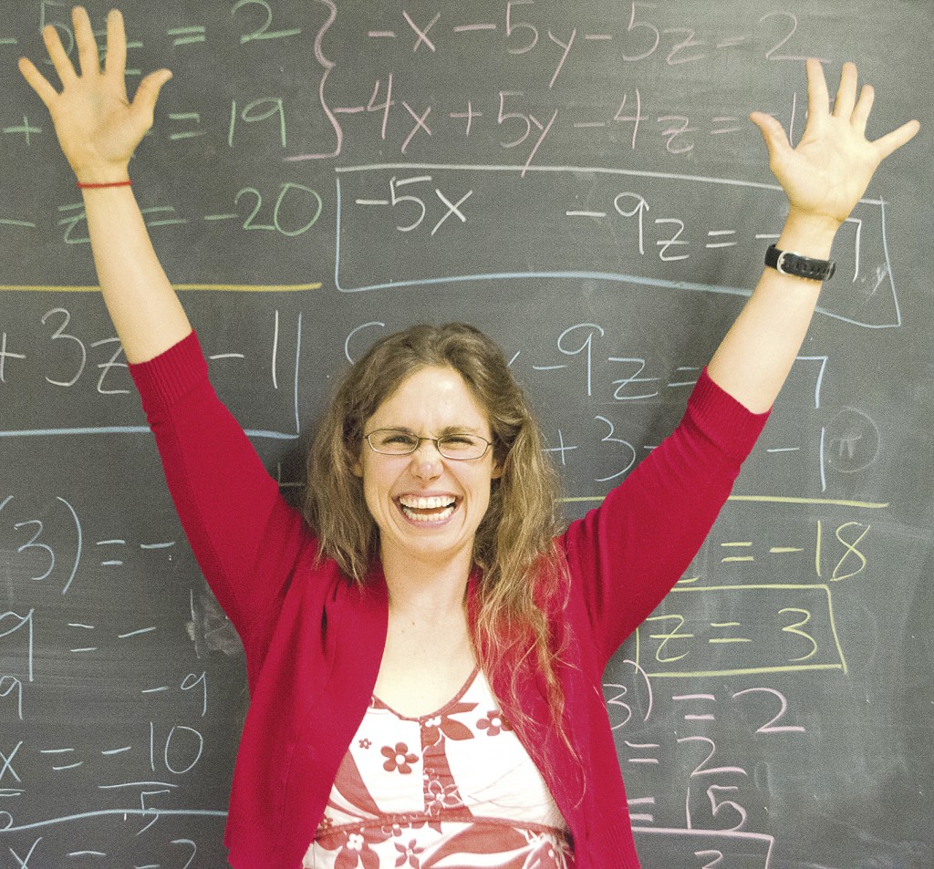 Kristin Lassonde, one of the new math professors, shows her excitement after solving a matrix equation at Pierce College. Photo: Stephen Castaneda