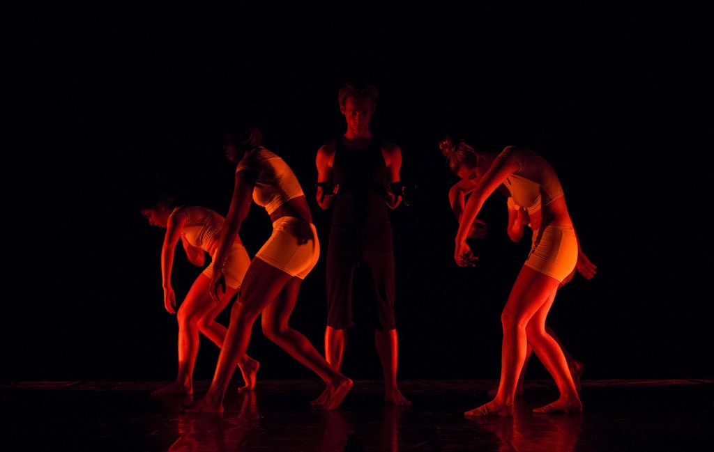William Jace stands in the center of other dancers during a performance of a dance titled "Diptych" during the 2014 Spring Dance Concert, Montage, in the Performance Tent of Pierce College in Woodland Hills, Calif., on May 29, 2014. Photo: Nicolas Heredia