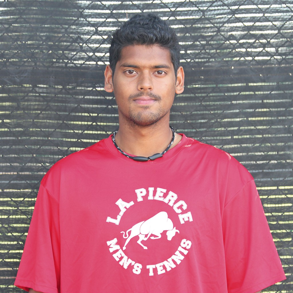 Pierce College tennis player Manish Kumar is 9-0 in singles matches for the spring 2015 season. Photo by: Megan Moureaux 