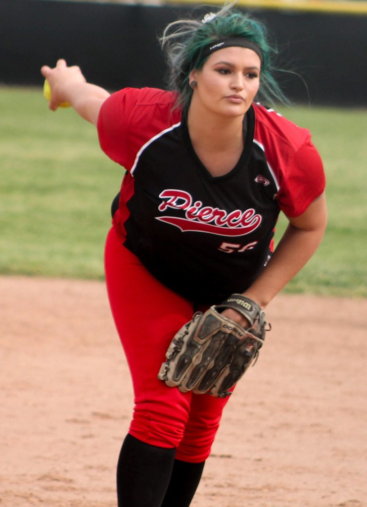 Katelyn Vogler preparing to pitch. On the Softball Field at Pierce College Woodland Hills Calif. Monday, March 17, 2015. Photo By Tim Daoud, 2015. Photo By Tim Daoud