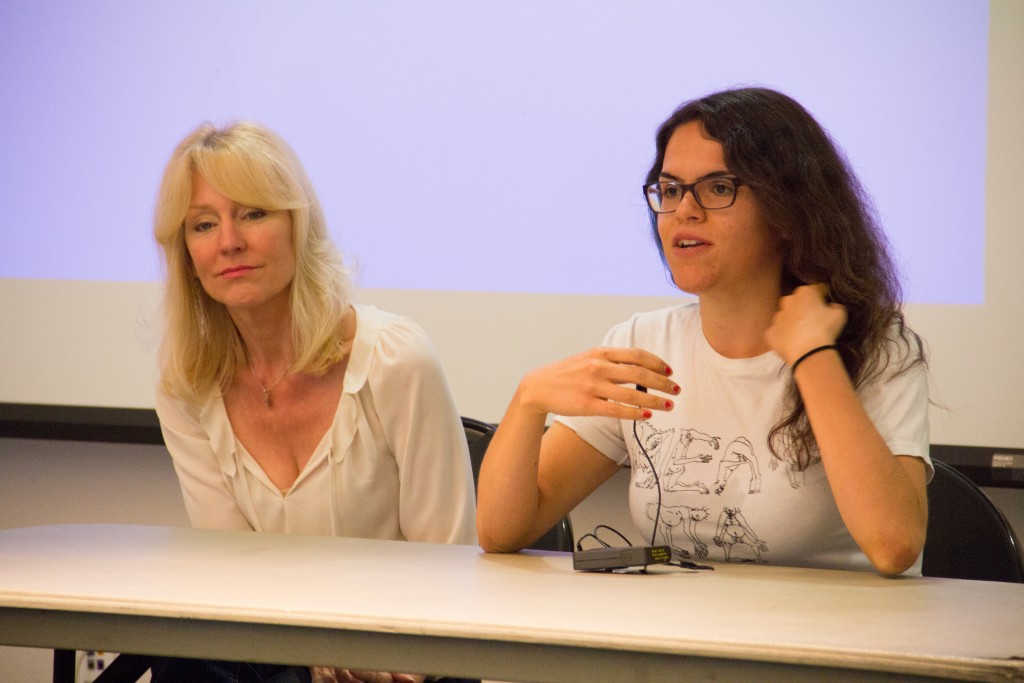 Rene Paredes(right), Feminist Club president and pre-nursing student at Pierce College,  introducing herself on Wednesday, March 18, 2015, in the Great Hall of Pierce College, Woodland Hills, Calif. Photo by: Alan Castro