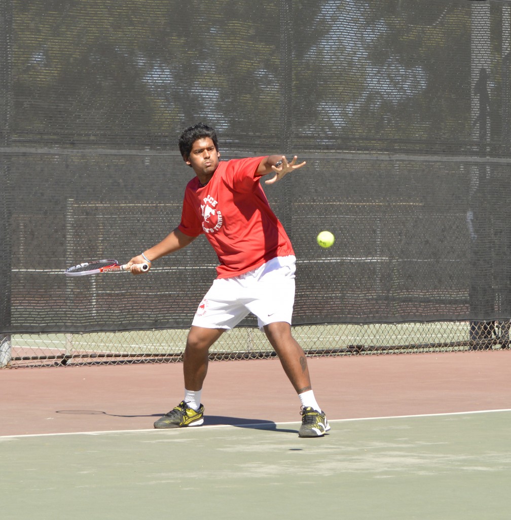 Pierce vs. Glendale Tennis Game, Manish Kumar from Pierce, gets ready to take the shot, at Pierce College Tennis Courts in Woodland Hills, Calif, on Thursday March 12, 2015 at 2:00pm, Manish swings his tennis raquet, and gets ready to time his hit with his pose ready. (Photo by: Andrew Caceres)