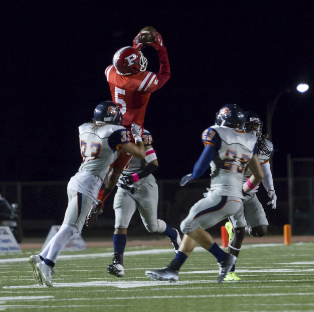 Number 5 Jamere goes up for the ball during the Brahmas game against Orange Coast College on Oct. 10, 2015 at John Shephard Staidum at Pierce College, Woodland Hills, Calif. The Brahmas would lose 35-7 against the Pirates. Photo by: Gustavo Sanchez