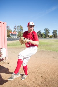 Pitcher Tommy Wilson warms up at the bullpen in Joe Kelly Field at Pierce College on Nov. 17, 2015.(photo  by Joshua Duarte)