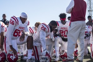 Pierce College’s football team takes knee after being defeated by Valley College, Pierce College lost the Football game 39 -7, at Los Angeles Valley College on Oct. 30, 2015 in Valley Glen, area of Los Angeles Calif. (Photo by: Edgar Amezcua)