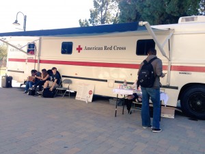 Students wait outside the American Red Cross' mobile blood bank that was parked on The Mall on Wednesday, Feb. 10. Woodland Hills, Calif. Photo: Samantha Bravo