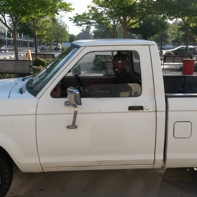 Ansar Jeff X sits inside a Plant Facilities truck on The Mall of Pierce College. Photo: Courtesy of Plant Facilities