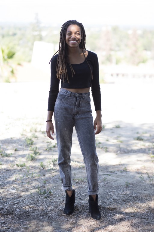 Ekeme Ekanem, Anthropology Club President,  poses for a portrait on a bench near Art Hill on May 2, 2016. At Los Angeles Pierce College in Woodland Hills, Calif. Photo: Taylor Arthur.