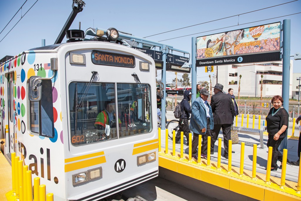 Riders exit the newly opened Expo Line at the Downtown Santa Monica station on Monday, May 23. The Expo Line connects at the 7th Street Metro Station and allows people living in the San Fernando Valley to visit Santa Monica using light rail. Photo: Mohammad Djauhari